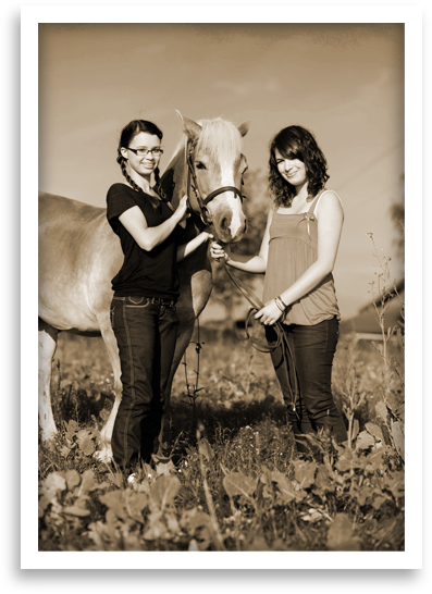 Two girls and a horse.